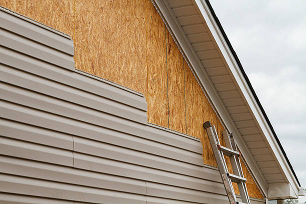 Professional Siding Replacement technician working in Finksburg, MD